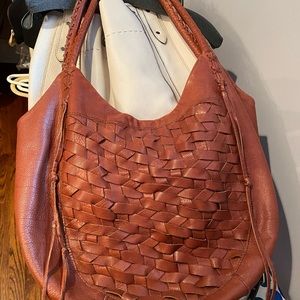 Línea Pelle woven tan leather tote in great condition